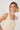 Dress To Pink Brisa Embroidered Sleeveless Top in Beige