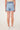 Hayden Girls Smocked Waist Ruffled Shorts in Light Denim