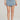 Saltwater Luxe Elisia Mini Skirt in Stonewash Denim - Estilo Boutique