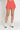 Gold Hinge Pleated Tennis Skirt in Dark Coral - Estilo Boutique