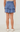 Hayden Girls Smocked Ruffle Tiered Mini Skirt in Denim - Estilo Boutique