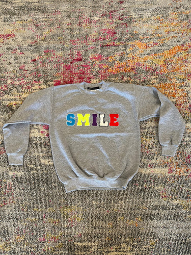 JET Fuzzy Letter Smile Crewneck in Grey - Estilo Boutique