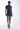 Karina Grimaldi Mallie Vegan Leather Mini Dress in Navy